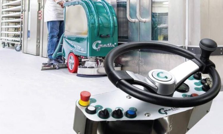 indoor vehicle control panel with steering wheel and several buttons and dials