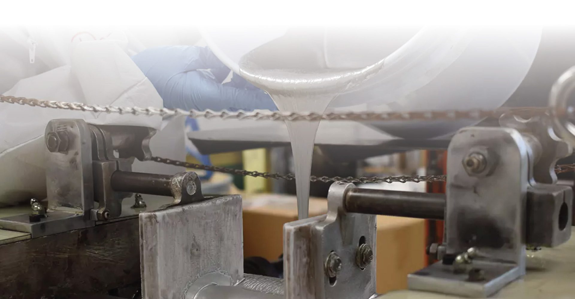 a shot of silver conductive ink being poured into a press